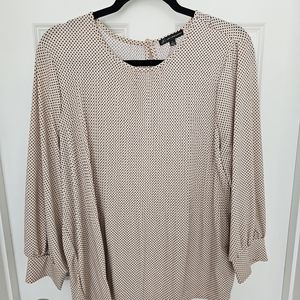 Pink with Black dots. 3/4 sleeve